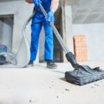 construction cleaning service. dust removal with vacuum cleaner